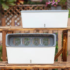 Self-Watering Planter Box with Integrated Reservoir